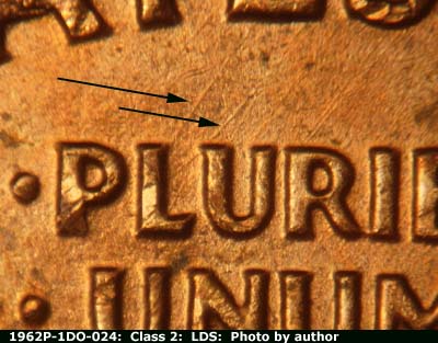 Die-stage C marker on 1962P•1DO•024 (1962 Doubled Die Obverse).