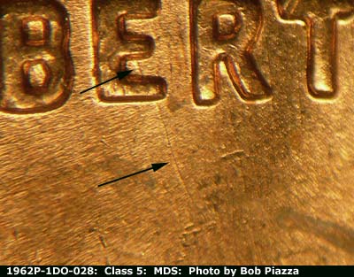 Die-stage B marker on 1962P•1DO•028 (1962 Doubled Die Obverse).