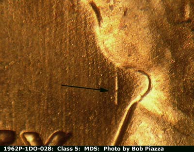 Die-stage B marker on 1962P•1DO•028 (1962 Doubled Die Obverse).