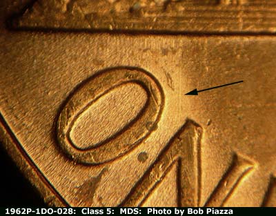 Die-stage B marker on 1962P•1DO•028 (1962 Doubled Die Obverse).