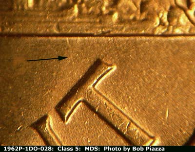 Die-stage B marker on 1962P•1DO•028 (1962 Doubled Die Obverse).