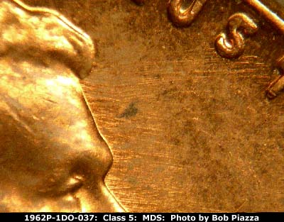 Die-stage B marker on 1962P•1DO•037 (1962 Doubled Die Obverse).