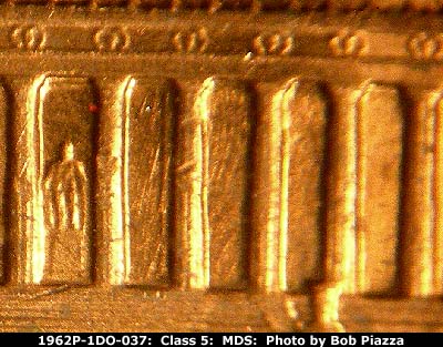 Die-stage B marker on 1962P•1DO•037 (1962 Doubled Die Obverse).