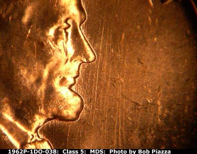 Die-stage B marker on 1962P•1DO•038 (1962 Doubled Die Obverse).