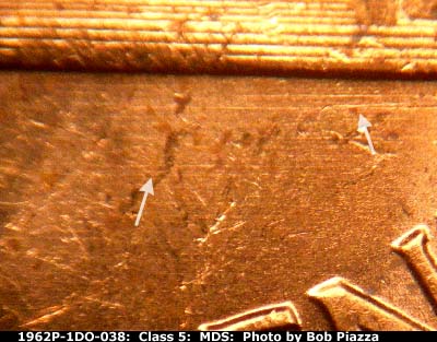 Die-stage B marker on 1962P•1DO•038 (1962 Doubled Die Obverse).