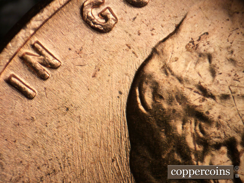Die-stage B marker on 1962P•1DO•041 (1962 Doubled Die Obverse).