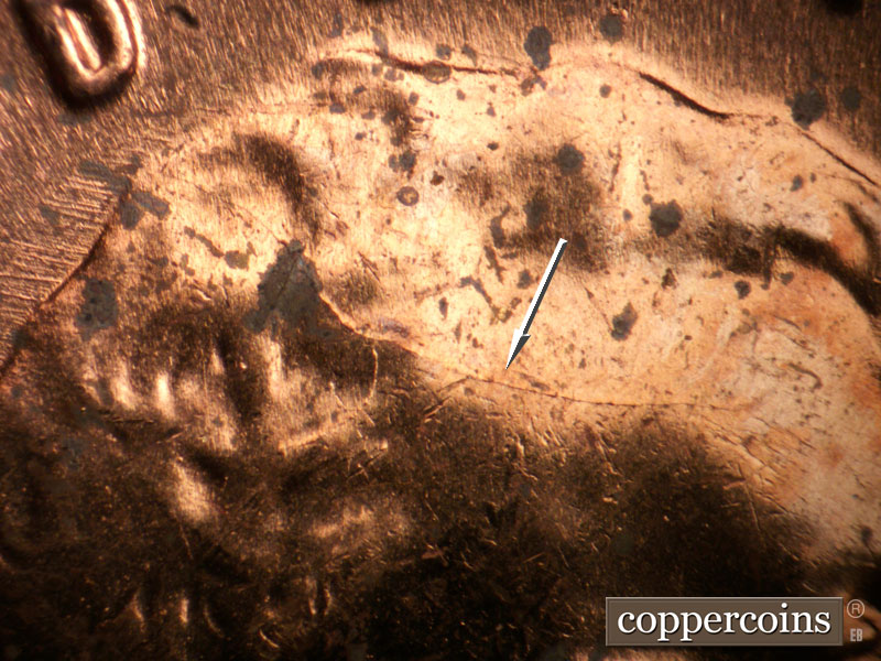 Die-stage B marker on 1962P•1DO•042 (1962 Doubled Die Obverse).