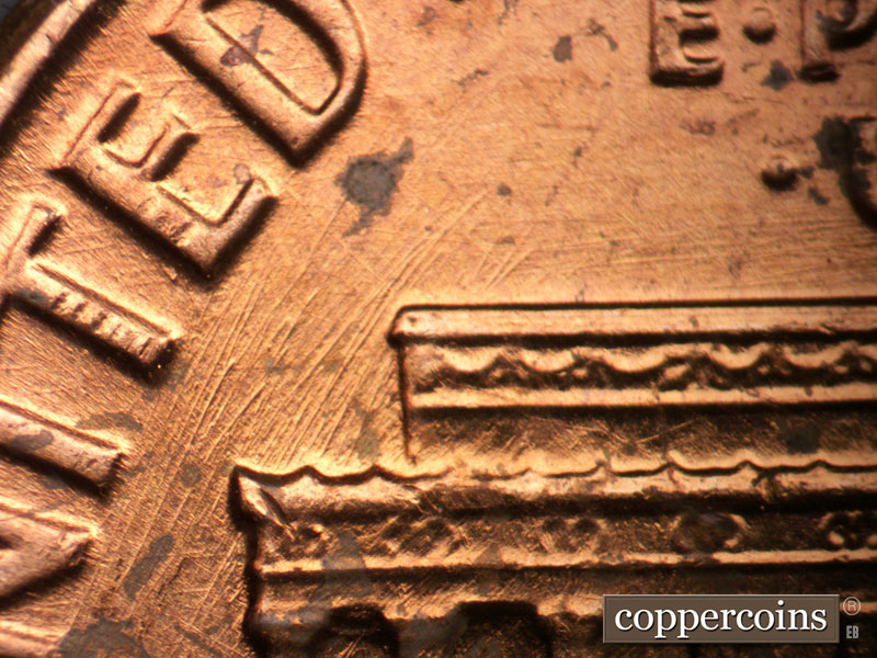 Die-stage B marker on 1962P•1DO•042 (1962 Doubled Die Obverse).
