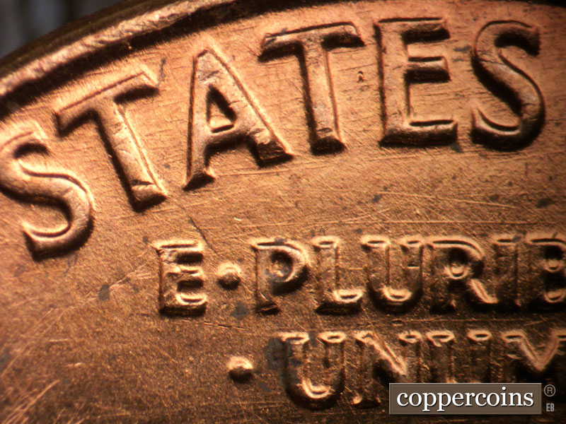 Die-stage B marker on 1962P•1DO•042 (1962 Doubled Die Obverse).