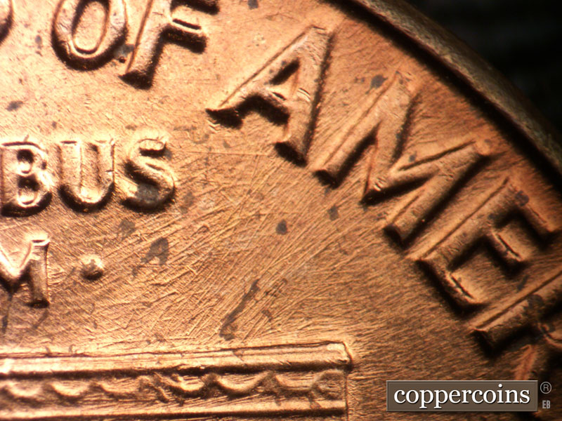 Die-stage B marker on 1962P•1DO•042 (1962 Doubled Die Obverse).