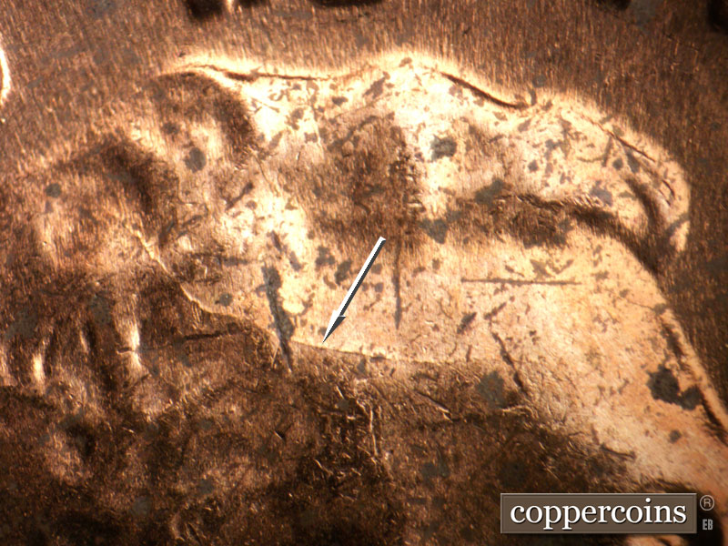 Die-stage C marker on 1962P•1DO•042 (1962 Doubled Die Obverse).