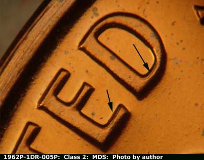 Die-stage B marker on 1962P•1DR•005P (1962 Doubled Die Reverse).