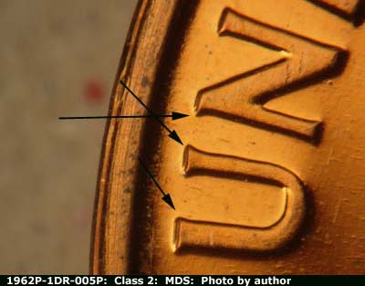 Die-stage B marker on 1962P•1DR•005P (1962 Doubled Die Reverse).