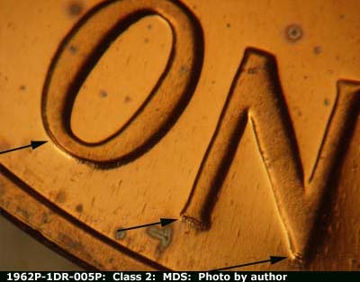 Die-stage B marker on 1962P•1DR•005P (1962 Doubled Die Reverse).