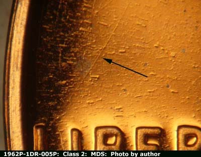 Die-stage B marker on 1962P•1DR•005P (1962 Doubled Die Reverse).
