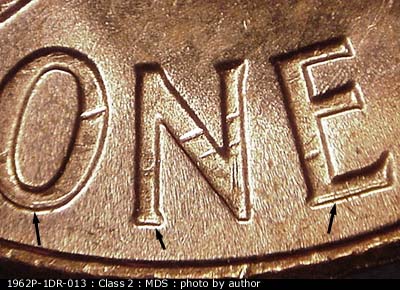 Die-stage B marker on 1962P•1DR•013 (1962 Doubled Die Reverse).