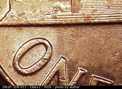 Die-stage B marker on 1962P•1DR•013 (1962 Doubled Die Reverse).