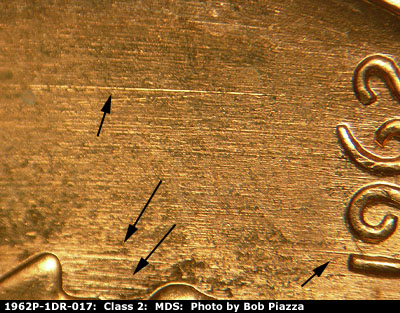 Die-stage B marker on 1962P•1DR•017 (1962 Doubled Die Reverse).