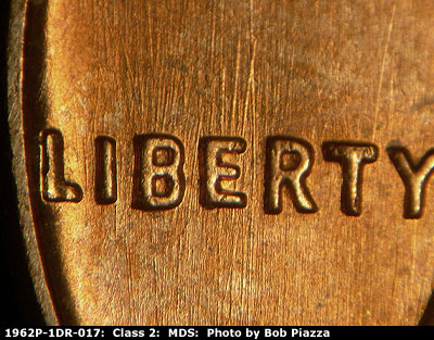 Die-stage B marker on 1962P•1DR•017 (1962 Doubled Die Reverse).
