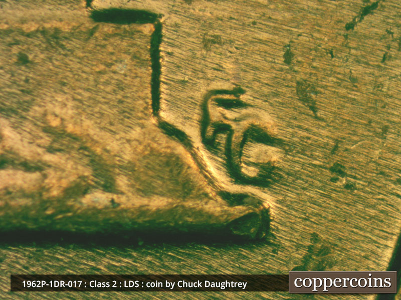 Die-stage C marker on 1962P•1DR•017 (1962 Doubled Die Reverse).