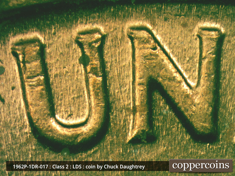 Die-stage C marker on 1962P•1DR•017 (1962 Doubled Die Reverse).