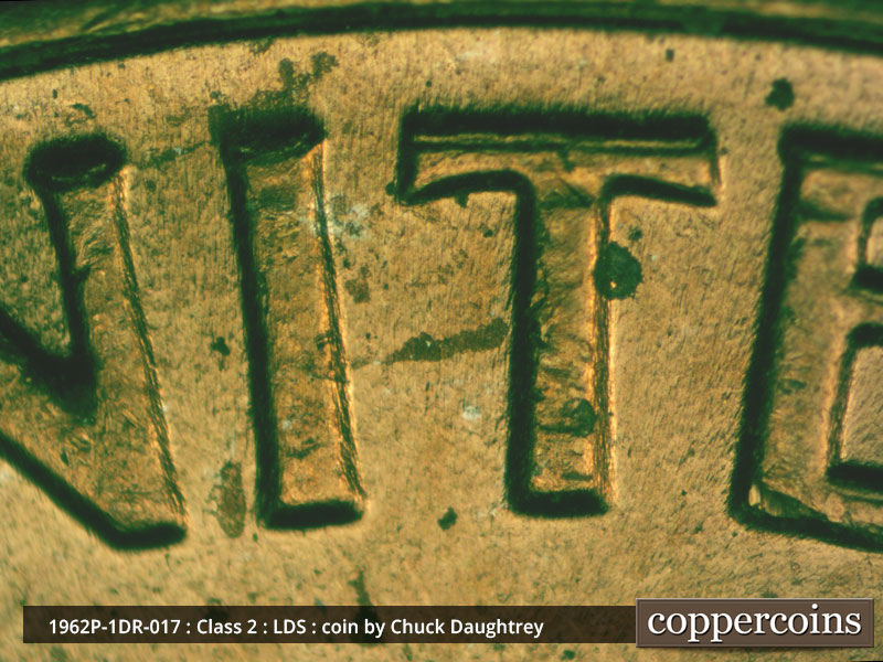 Die-stage C marker on 1962P•1DR•017 (1962 Doubled Die Reverse).