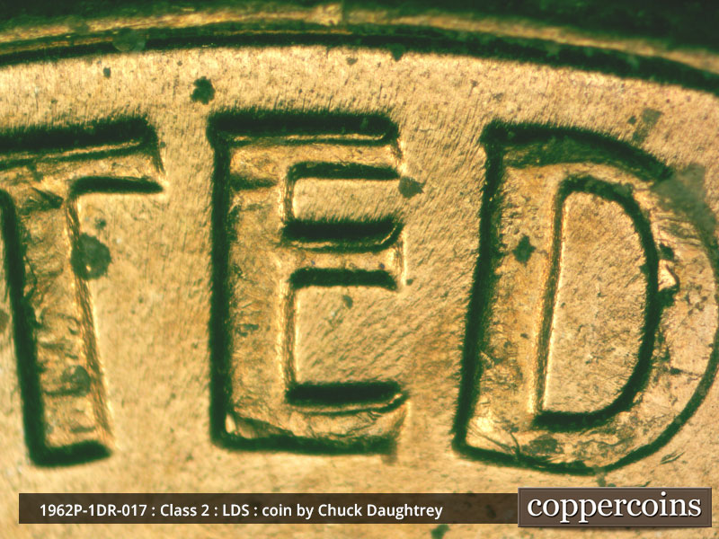 Die-stage C marker on 1962P•1DR•017 (1962 Doubled Die Reverse).