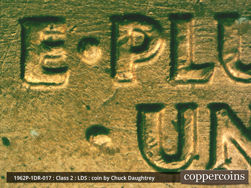Die-stage C marker on 1962P•1DR•017 (1962 Doubled Die Reverse).