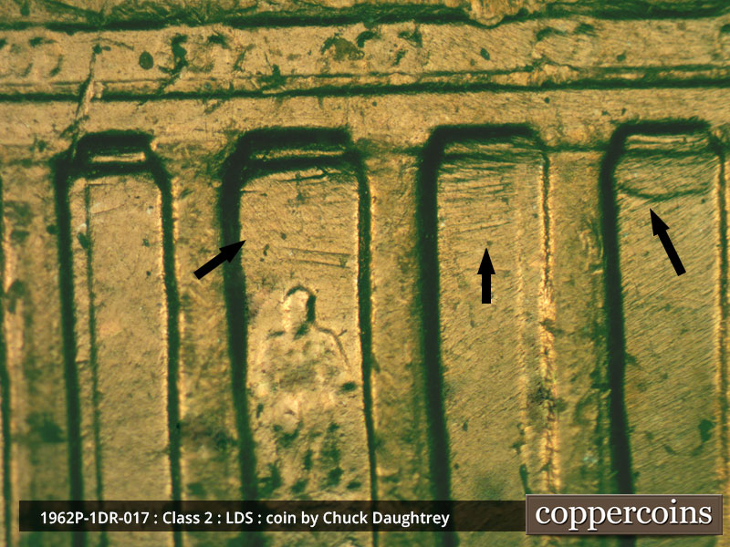 Die-stage C marker on 1962P•1DR•017 (1962 Doubled Die Reverse).