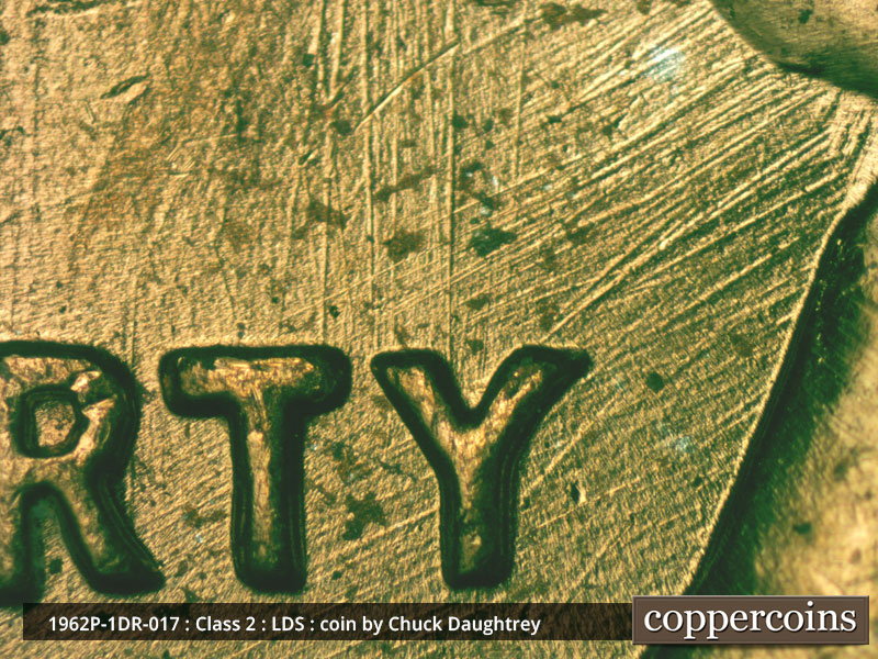 Die-stage C marker on 1962P•1DR•017 (1962 Doubled Die Reverse).