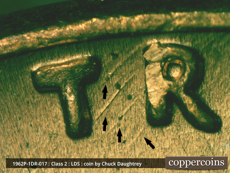 Die-stage C marker on 1962P•1DR•017 (1962 Doubled Die Reverse).