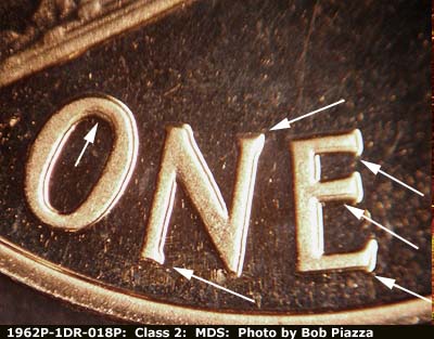 Die-stage B marker on 1962P•1DR•018P (1962 Doubled Die Reverse).