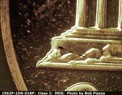Die-stage B marker on 1962P•1DR•018P (1962 Doubled Die Reverse).