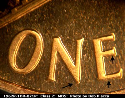 Die-stage B marker on 1962P•1DR•021P (1962 Doubled Die Reverse).