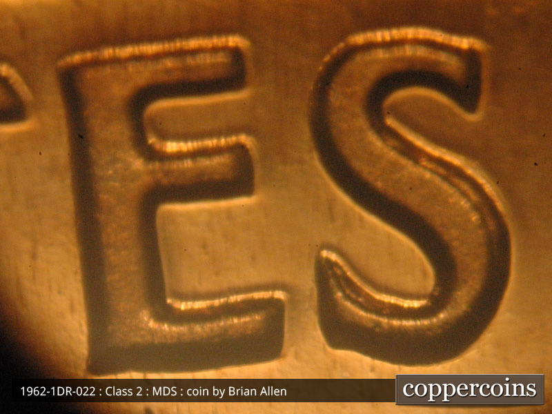 Die-stage B marker on 1962P•1DR•022P (1962 Doubled Die Reverse).