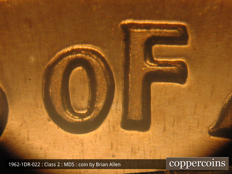 Die-stage B marker on 1962P•1DR•022P (1962 Doubled Die Reverse).