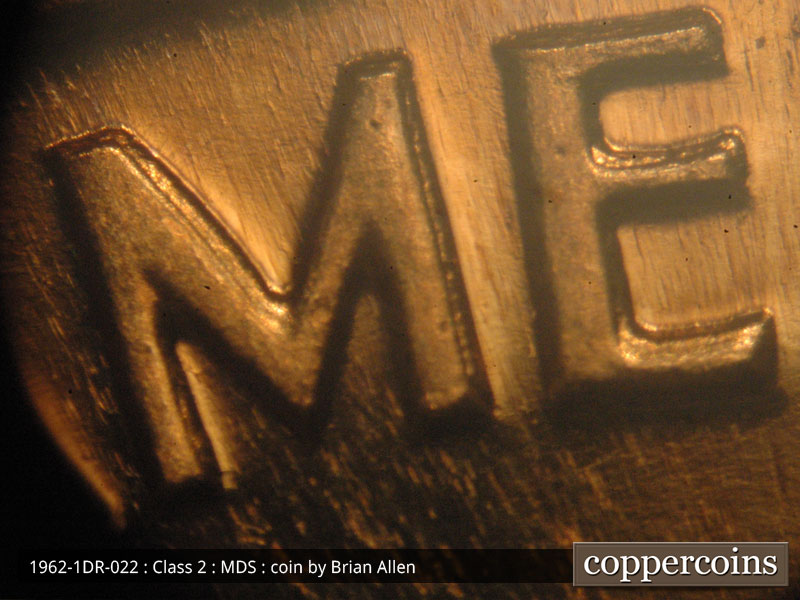 Die-stage B marker on 1962P•1DR•022P (1962 Doubled Die Reverse).