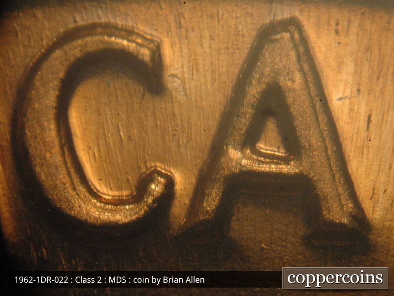 Die-stage B marker on 1962P•1DR•022P (1962 Doubled Die Reverse).