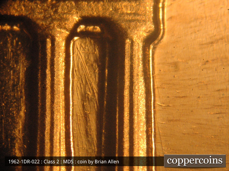 Die-stage B marker on 1962P•1DR•022P (1962 Doubled Die Reverse).