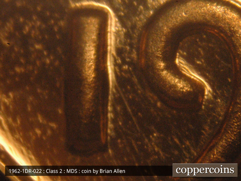 Die-stage B marker on 1962P•1DR•022P (1962 Doubled Die Reverse).