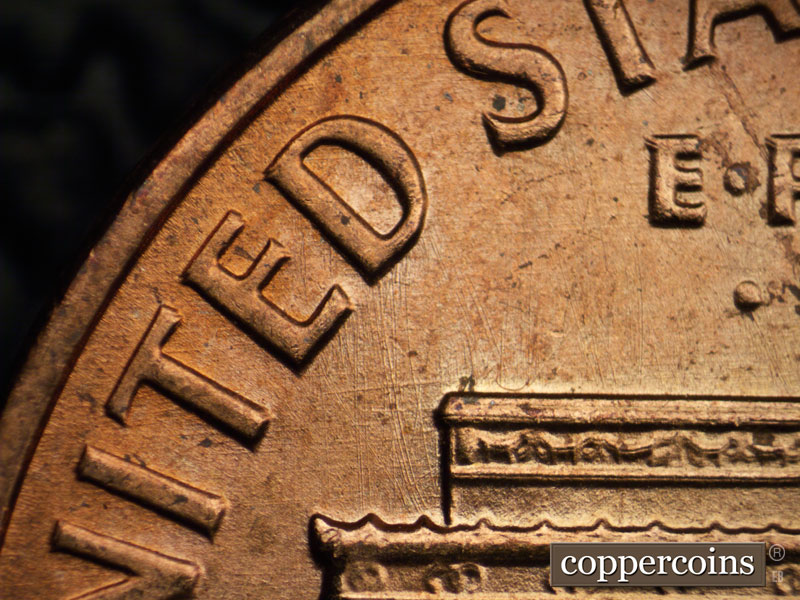 Die-stage B marker on 1962P•1DR•023 (1962 Doubled Die Reverse).