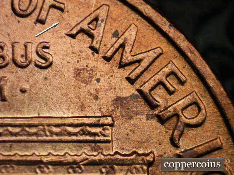 Die-stage B marker on 1962P•1DR•023 (1962 Doubled Die Reverse).