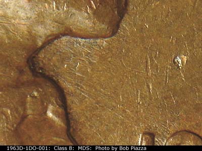 Die-stage B marker on 1963D•1DO•001 (1963 Doubled Die Obverse).