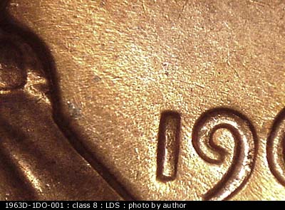 Die-stage C marker on 1963D•1DO•001 (1963 Doubled Die Obverse).