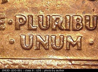 Die-stage C marker on 1963D•1DO•001 (1963 Doubled Die Obverse).