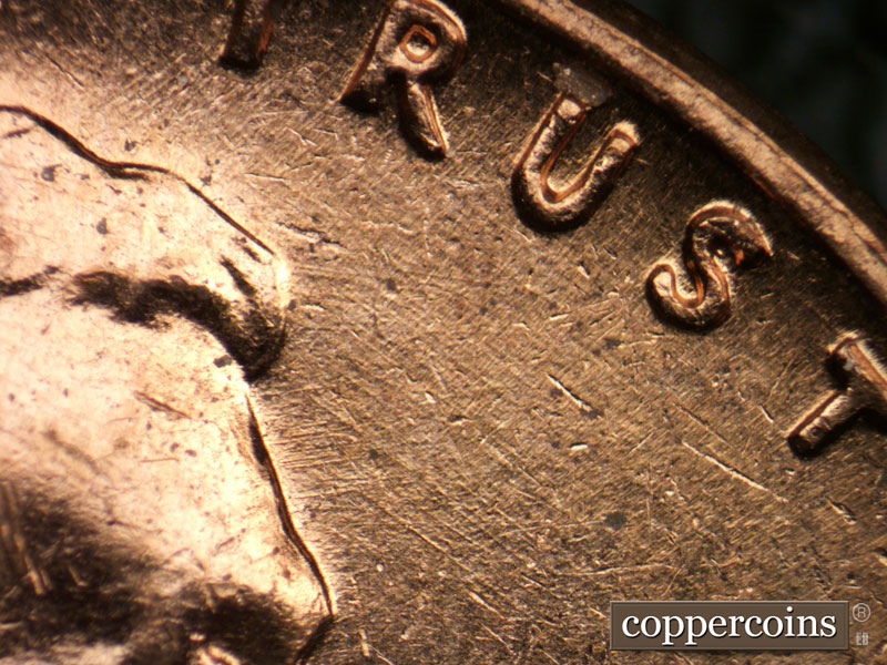 Die-stage B marker on 1963D•1DO•003 (1963 Doubled Die Obverse).