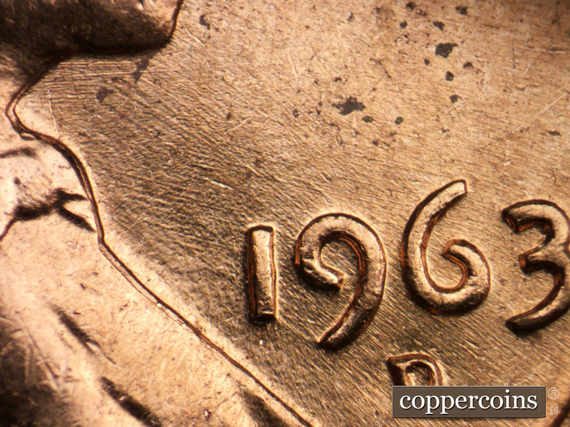 Die-stage B marker on 1963D•1DO•003 (1963 Doubled Die Obverse).