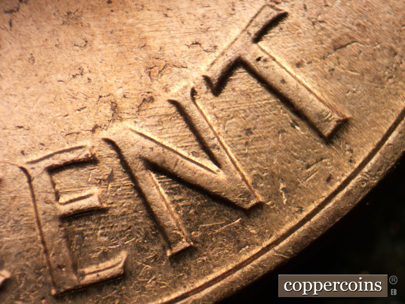 Die-stage B marker on 1963D•1DO•003 (1963 Doubled Die Obverse).