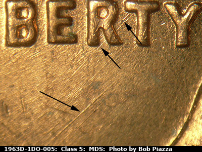 Die-stage B marker on 1963D•1DO•005 (1963 Doubled Die Obverse).