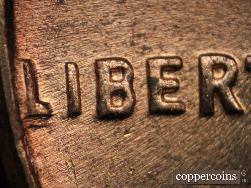 Die-stage C marker on 1963D•1DO•005 (1963 Doubled Die Obverse).